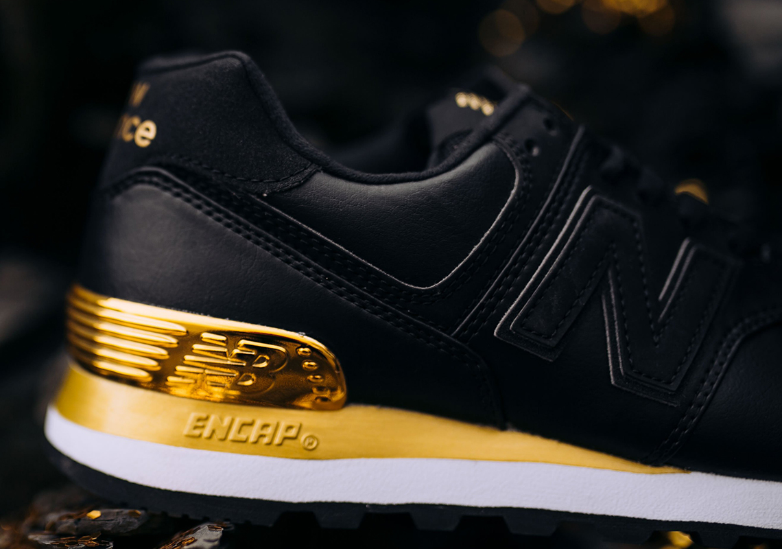 new balance 574 womens black and gold