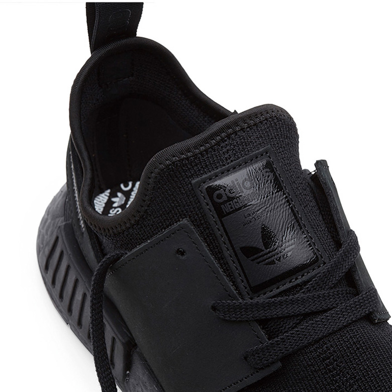 Nmd triple hotsell black 2018