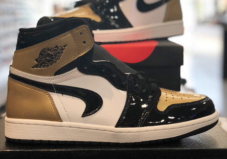 Jordan 1 "Gold Toe" Upside Swoosh | SneakerNews.com