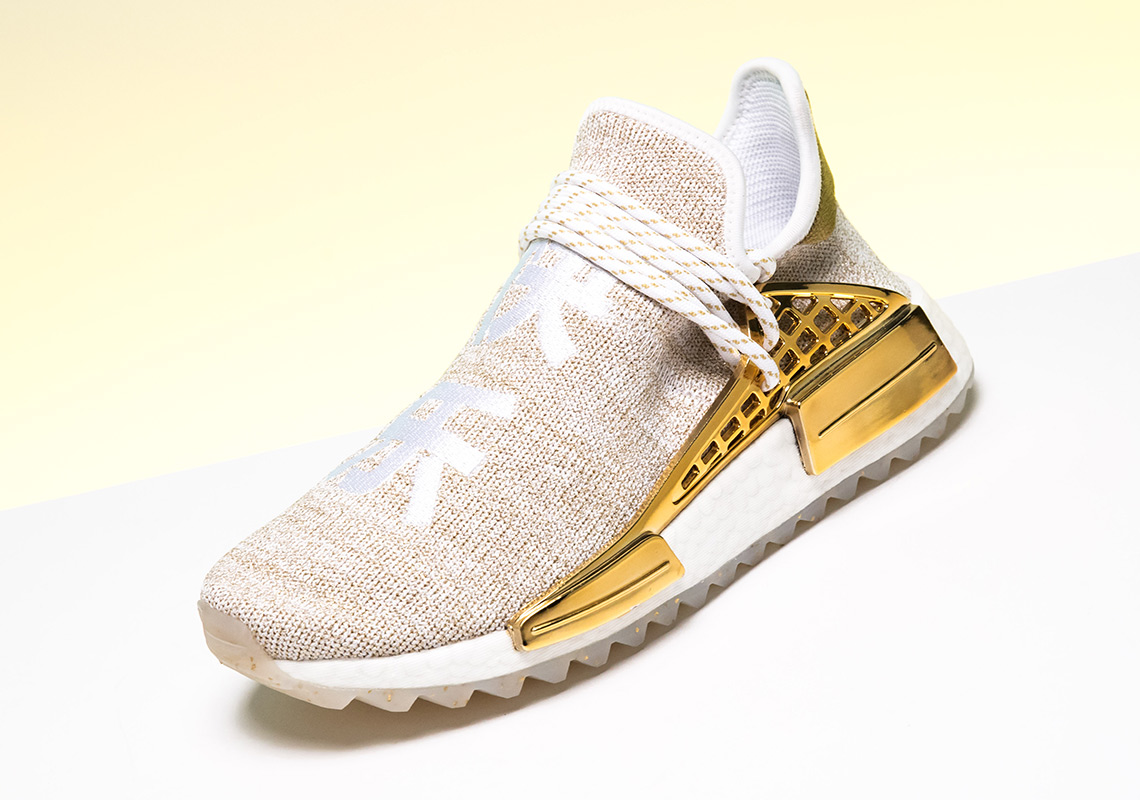 Pharrell x Adidas NMD Hu 'Gold' Release Info: How to Buy the Sneaker –  Footwear News