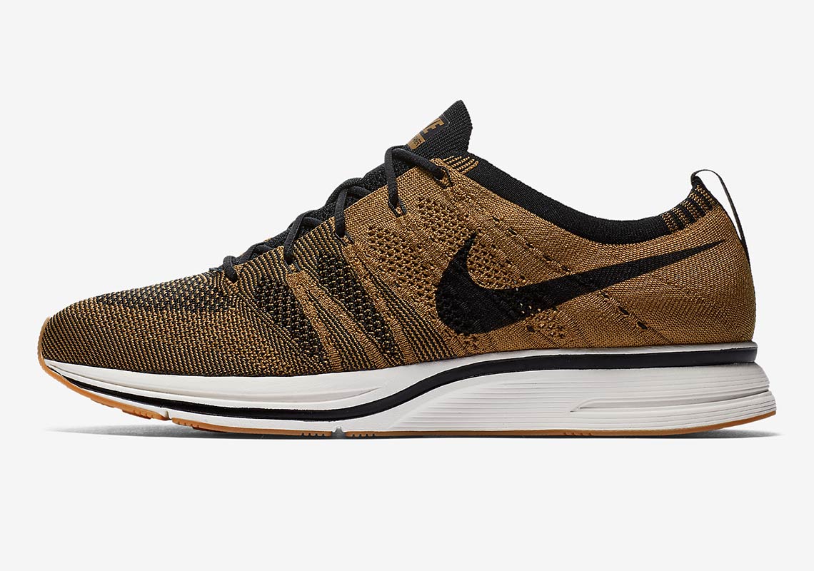 nike flyknit gold and black