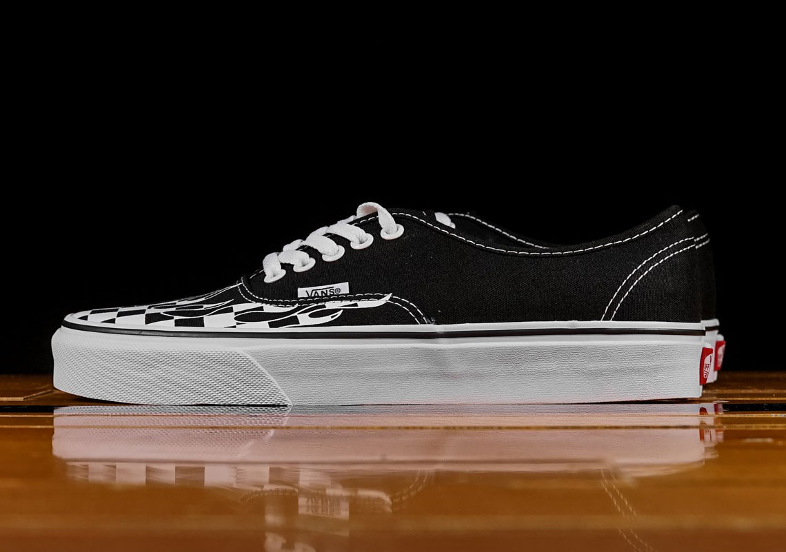 Black vans shop with checkered flames