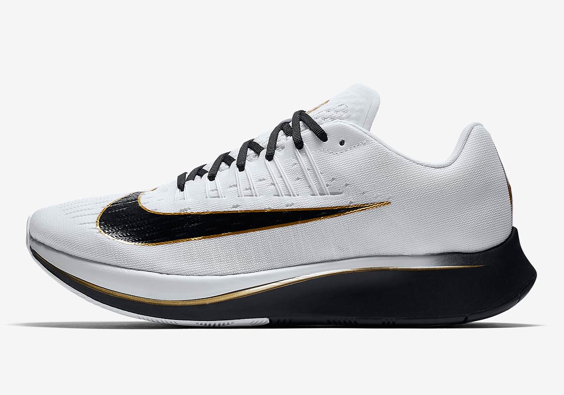 nike zoom gold and white