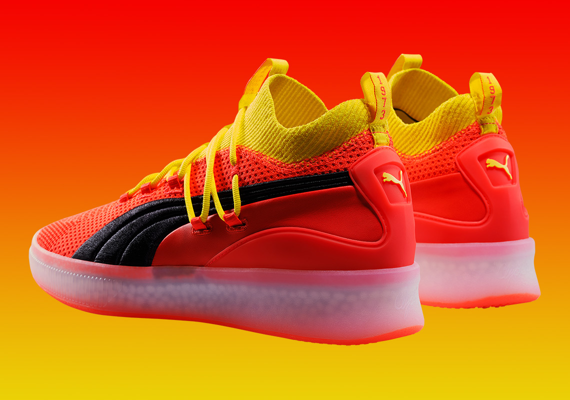 Puma clyde court disrupt orange best sale black yellow