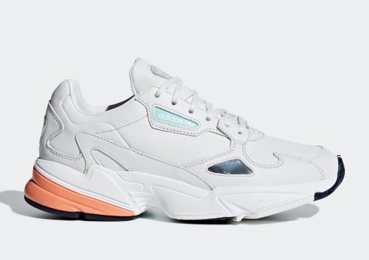 The adidas Falcon For Women Appears In A Crisp White And Orange