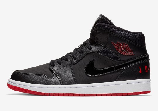 The Air Jordan 1 Mid “Bred” Features Classic Logo On The Heel