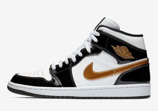 The Air Jordan 1 Mid Returns To Black And Gold Patent Leather