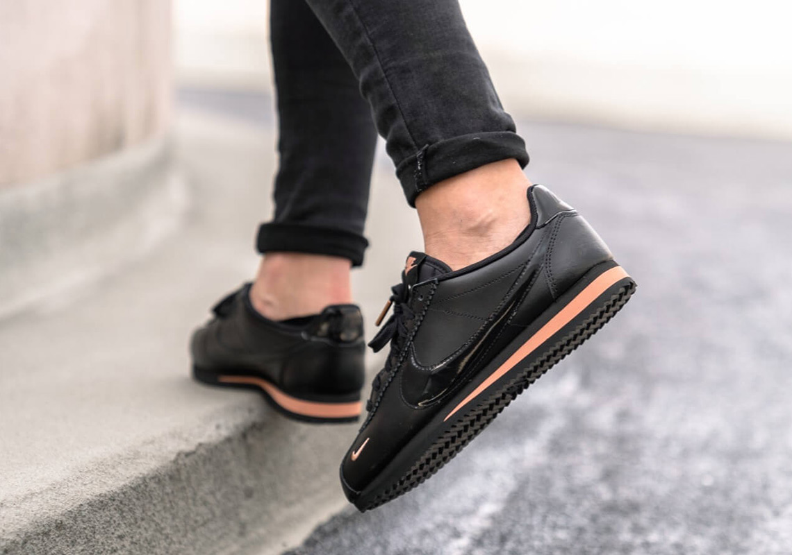 black and pink nike cortez