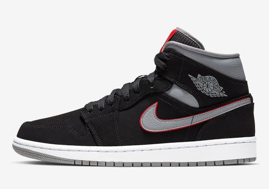 The Air Jordan 1 Mid Returns In A Classy Black, Red, And Grey