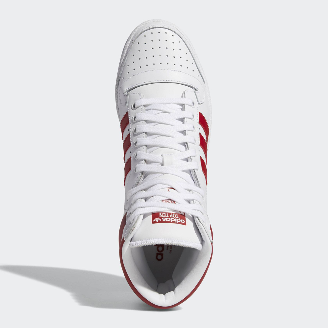 white and red top ten adidas