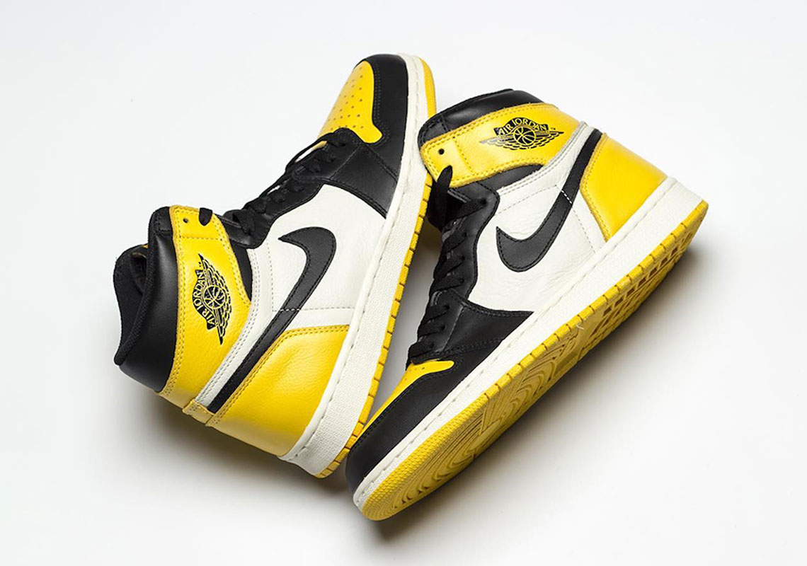 black and yellow jordan 1