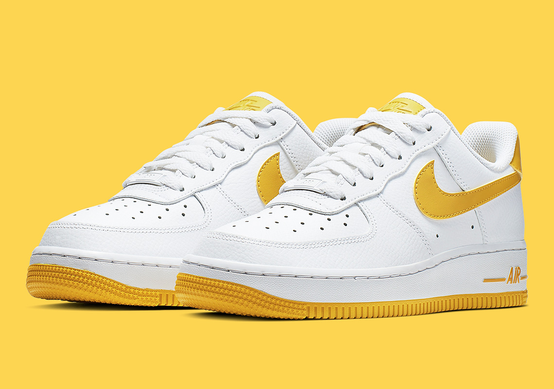nike air force with yellow swoosh