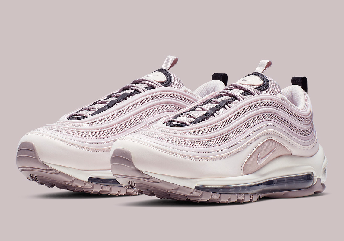 white and pink nike 97