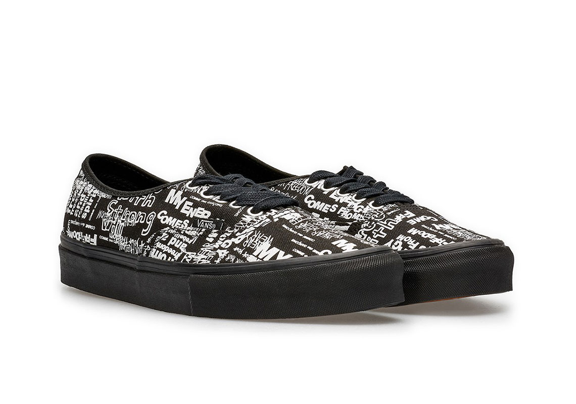 white vans with black words