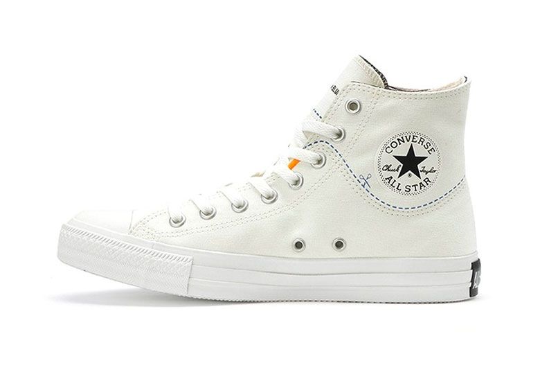 All white converse with black clearance line