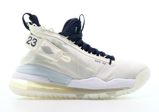 The jordan rouge Proto Max 720 Sees Pale Ivory Uppers With Midnight Navy