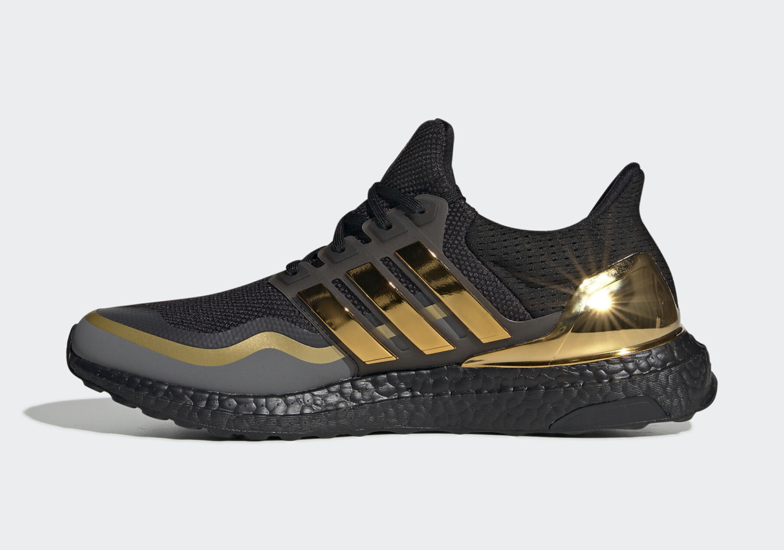 black adidas with gold sole