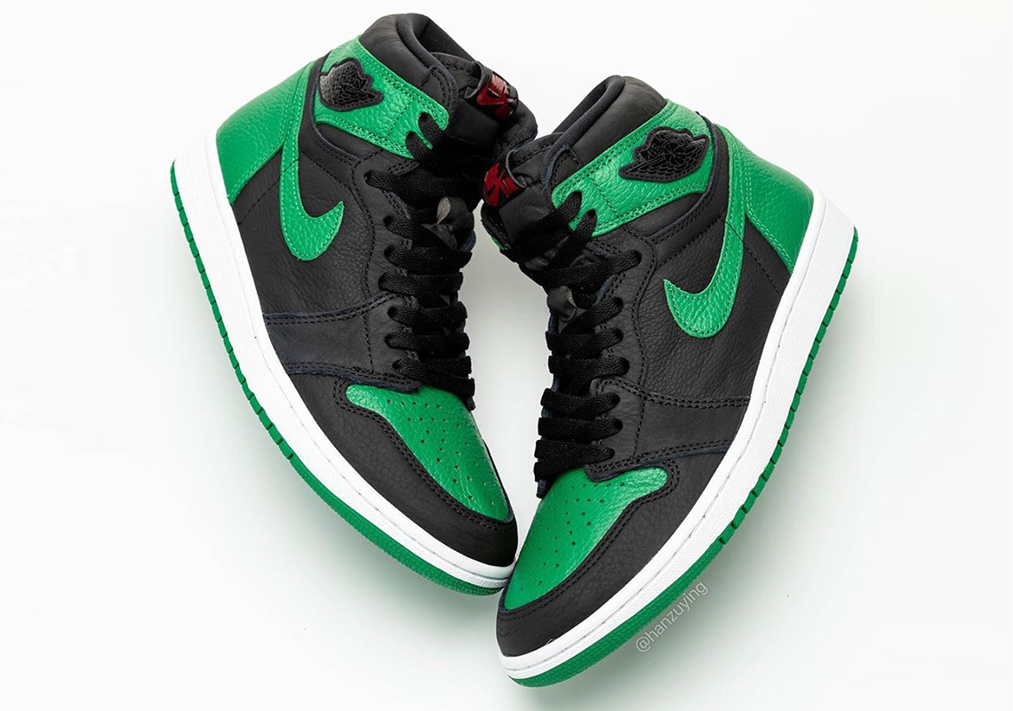 green and black jordan 1