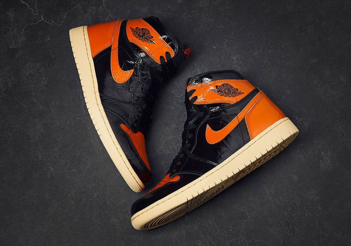 orange and black jordans 2019