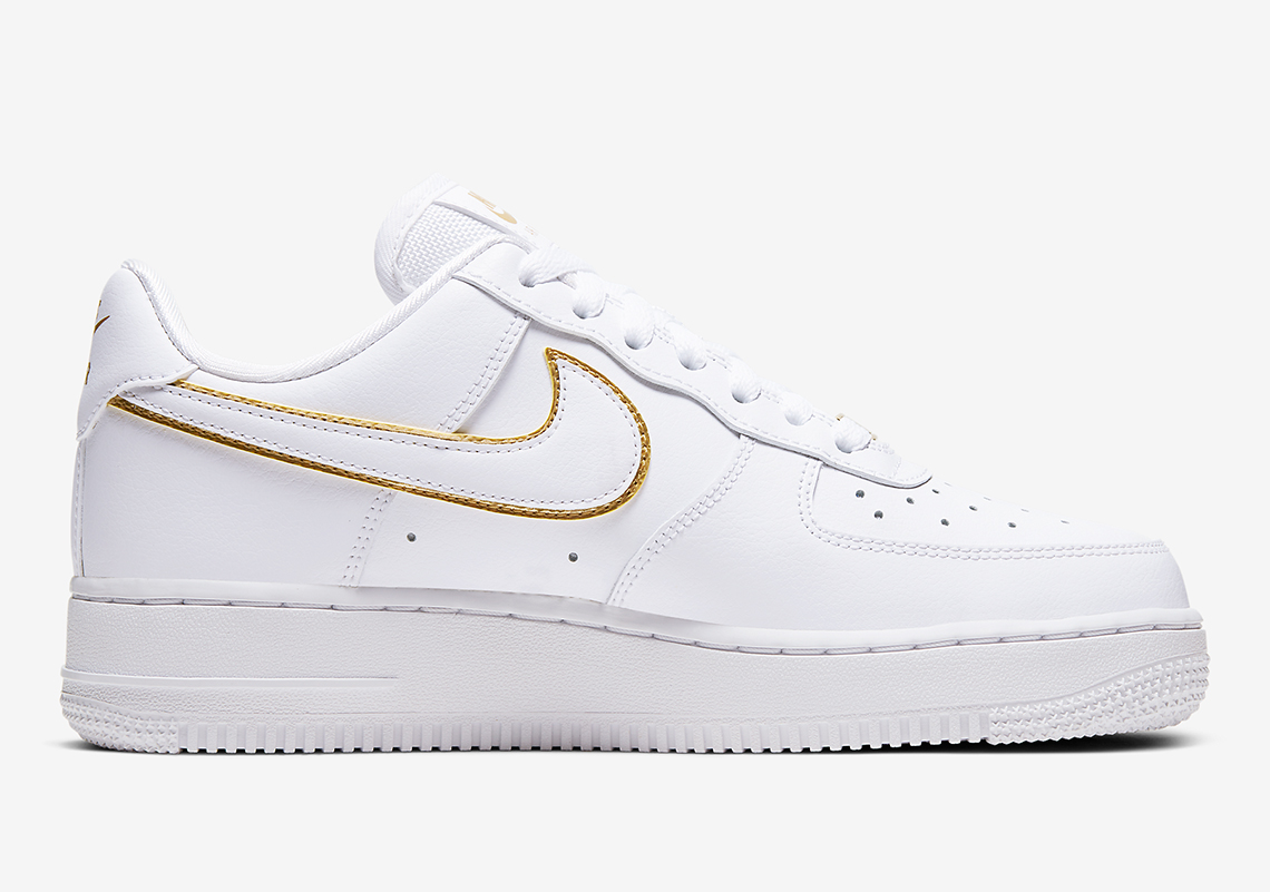 nike air force with gold outline