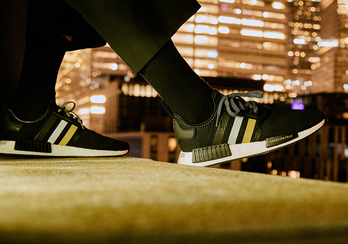 Adidas nmd r1 nere e shop oro