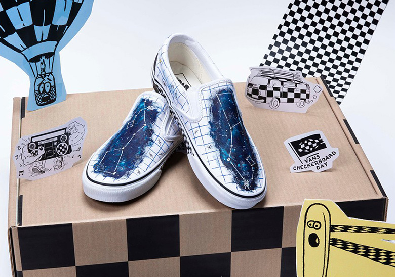 blue slip on vans with checkerboard sole