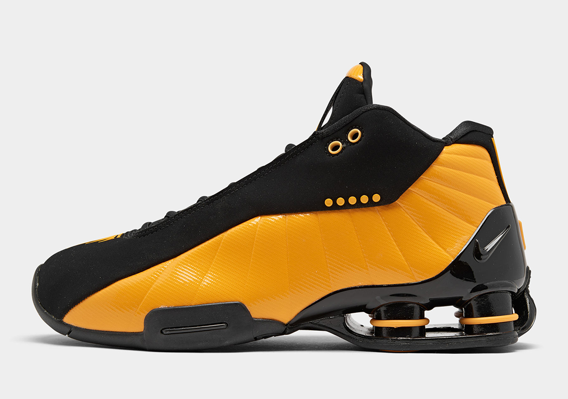 nike shox black and yellow