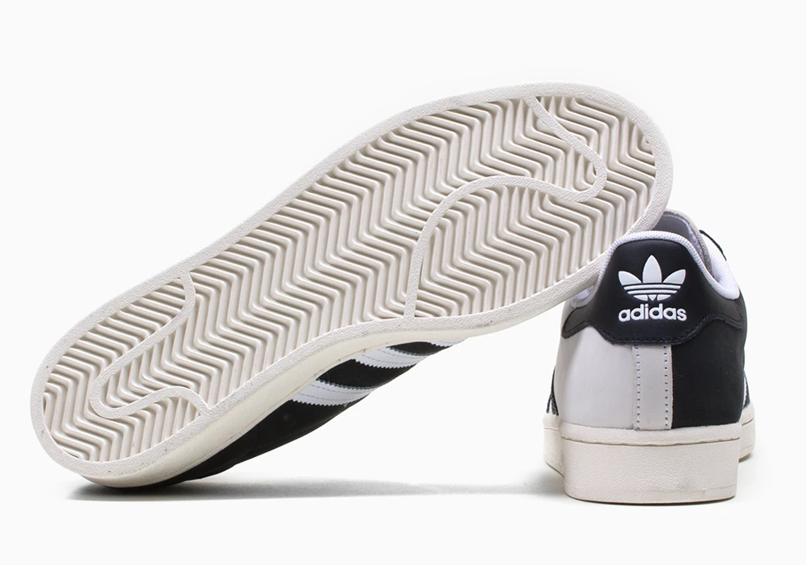 The Iconic White and Black adidas Superstar Combine Into One Split-Colored  Release 