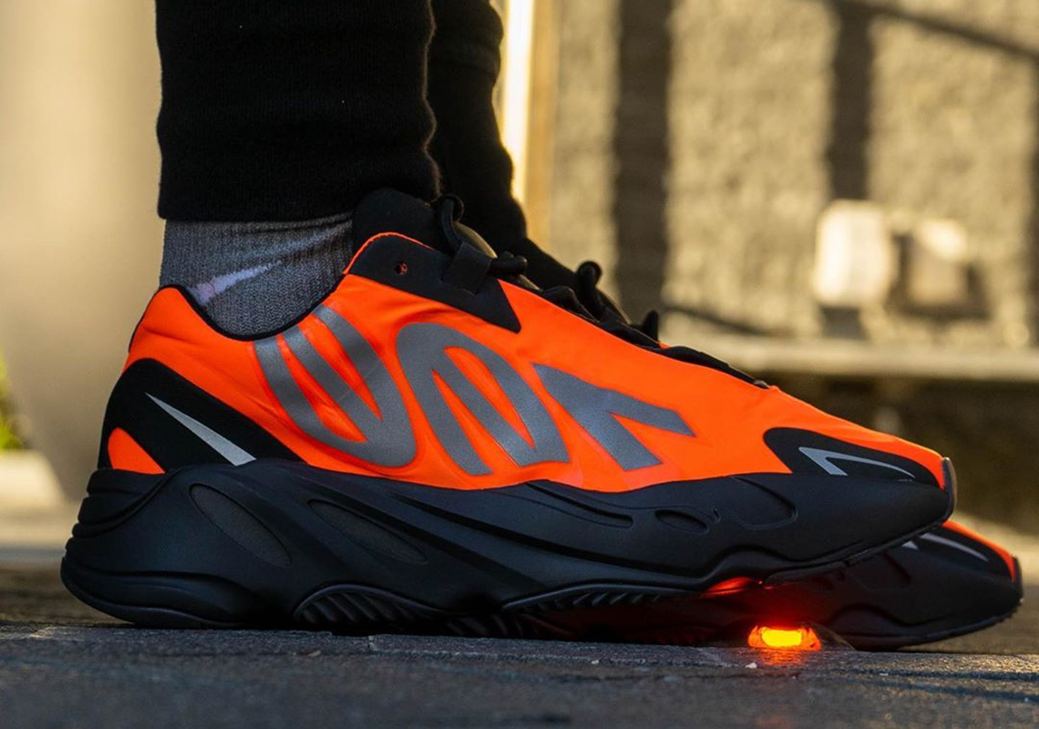 black and orange yeezy 700