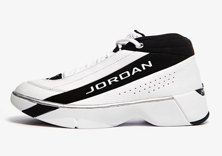 team jordans black and white