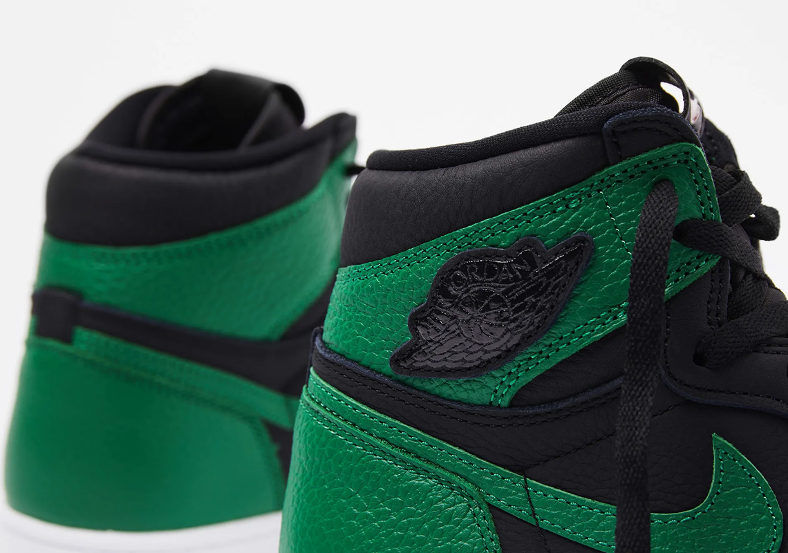 green and black jordan 1 with red laces