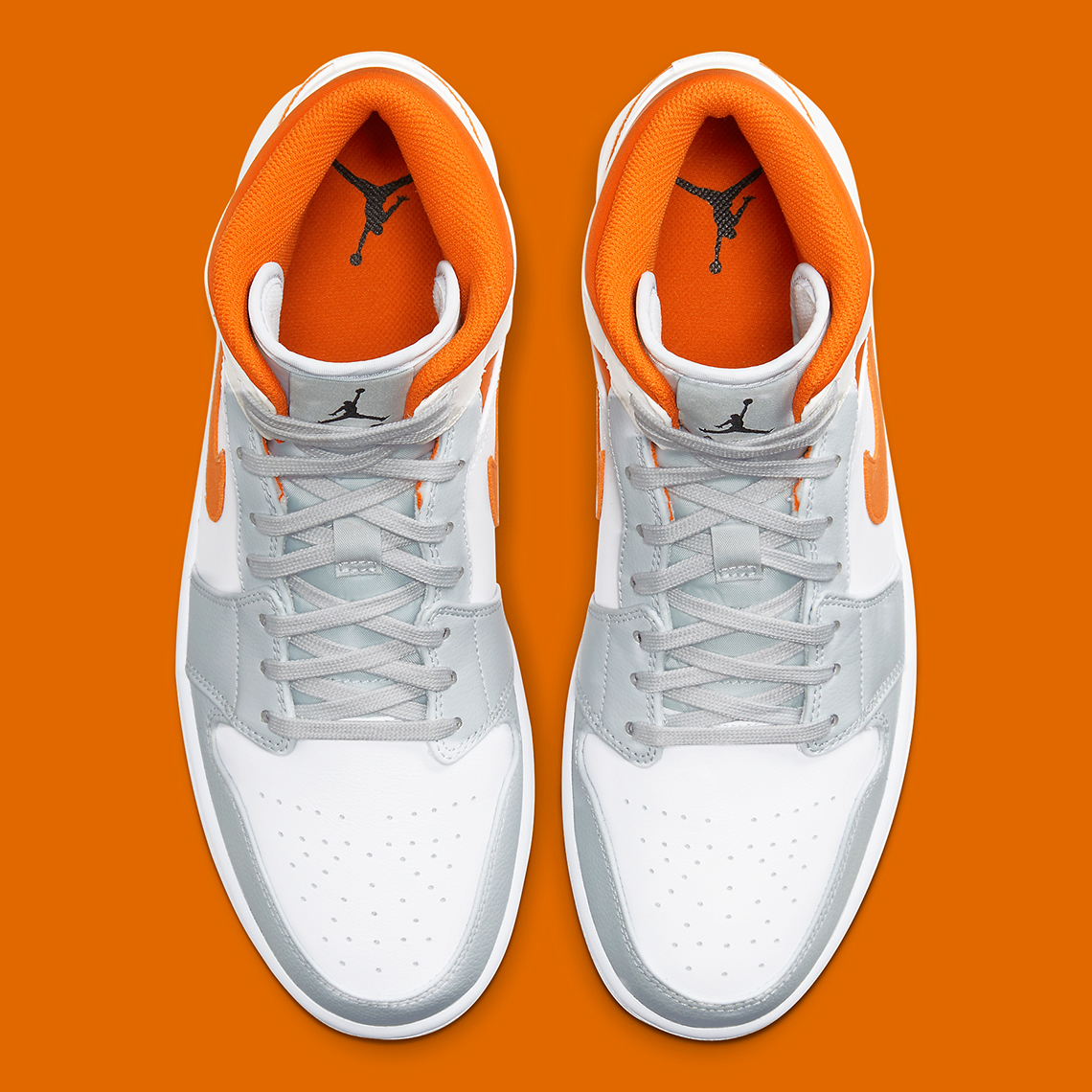 grey white and orange jordans
