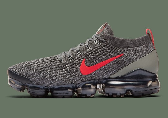 The these nike Vapormax Flyknit 3 Adds Crimson Against A Dark Olive Knit