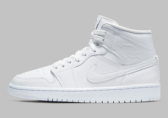 The Air Jordan 1 Mid Appears In A Lux White Snakeskin