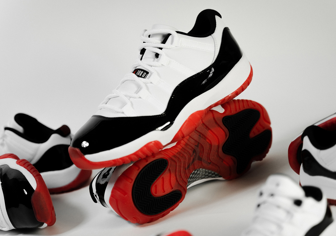 black and red jordan 11 concord