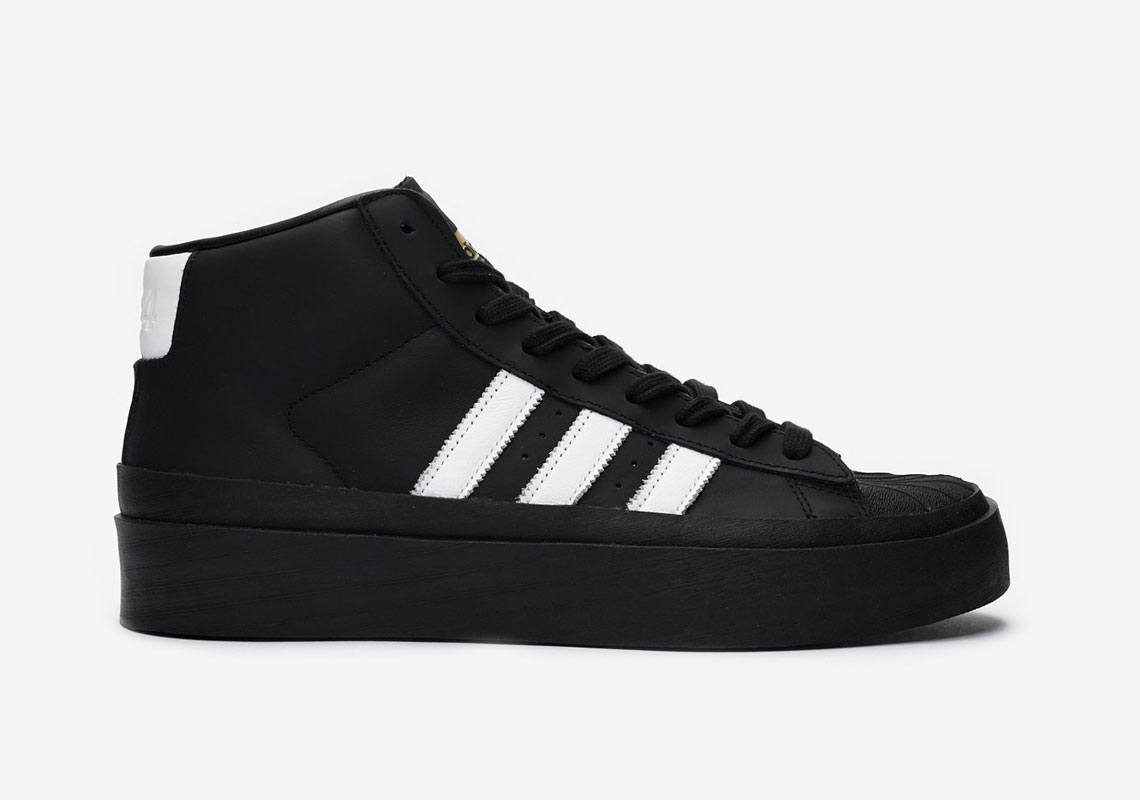 Adidas pro model hot sale black white stripes