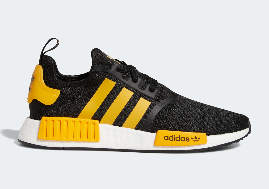 nmd r1 gold and black