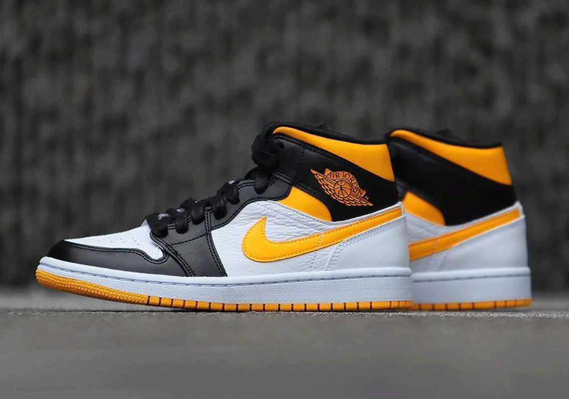 retro 1 mid black and yellow