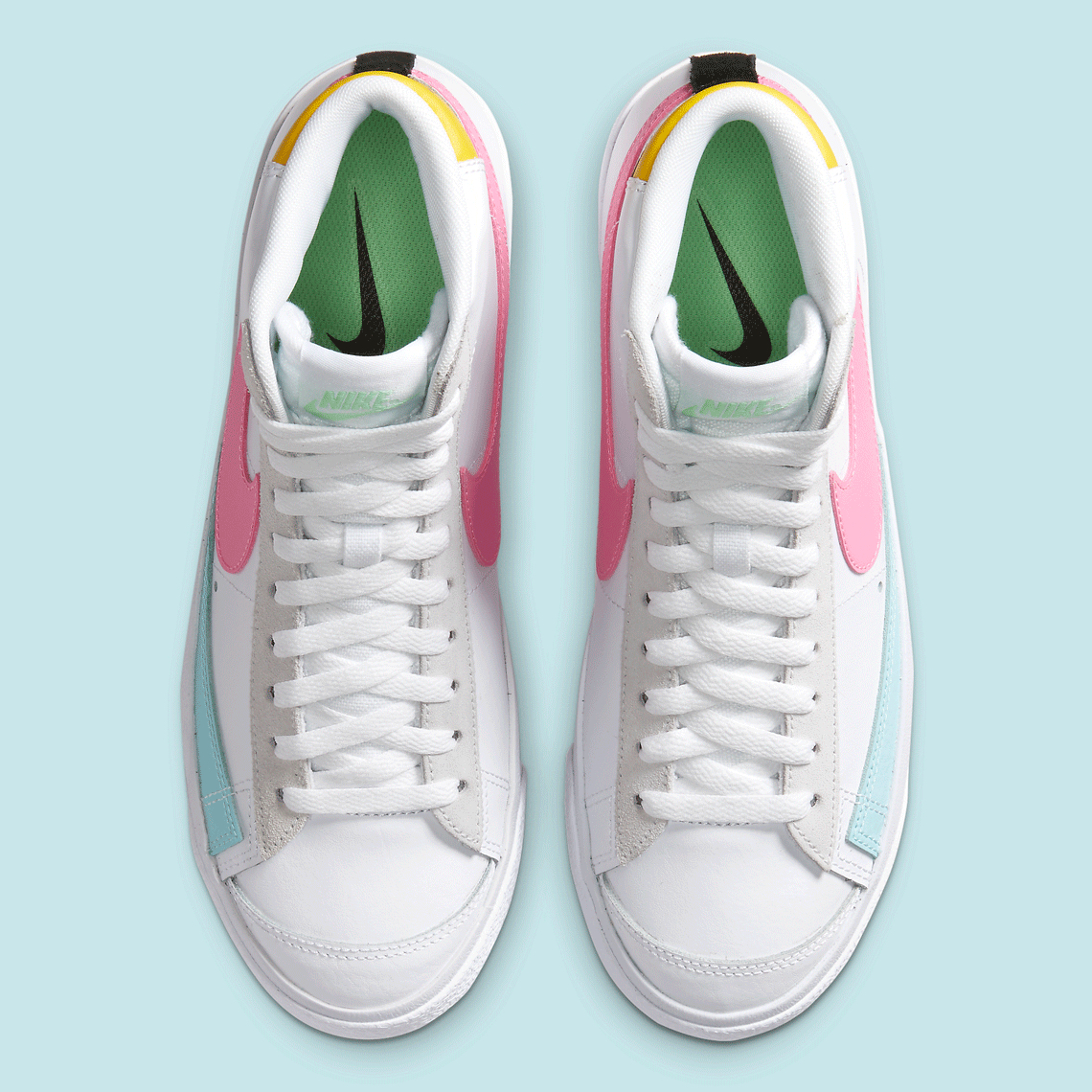 nike blazer mid 77 trainers in white pink and blue