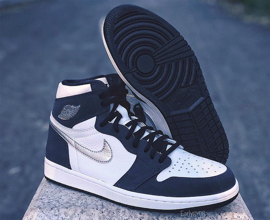 white and navy jordan 1