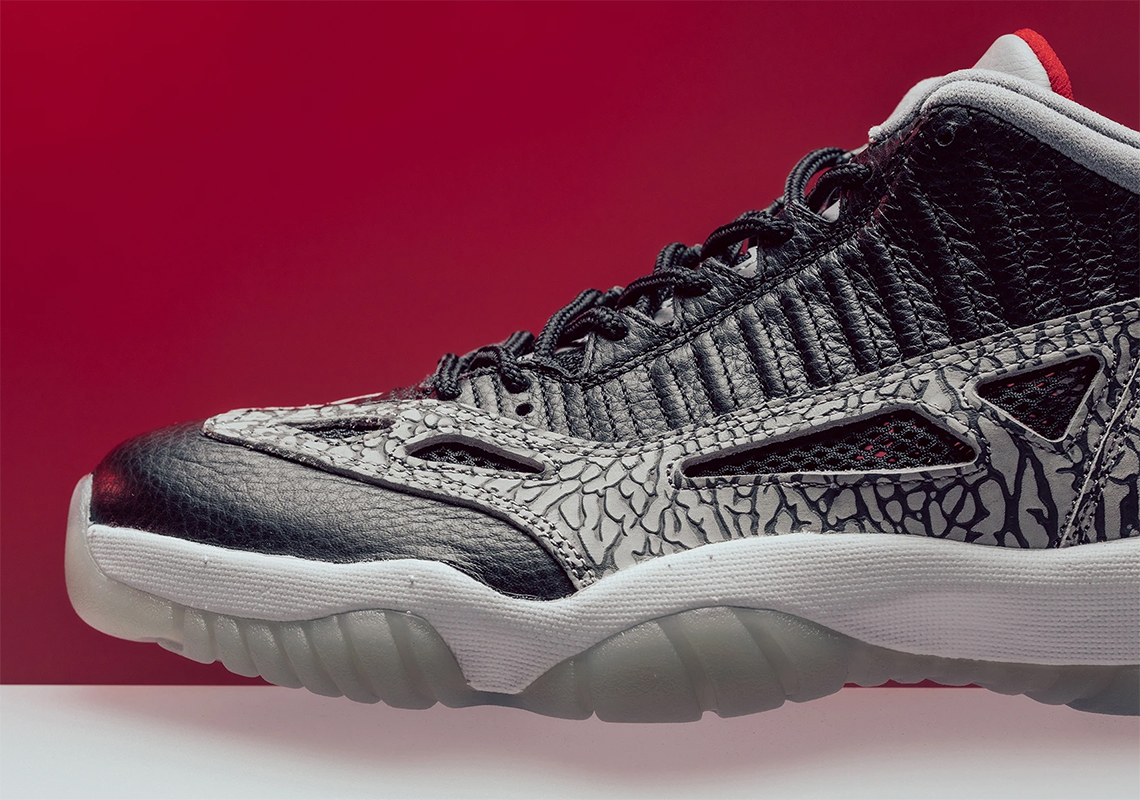 jordan 11 low black cement