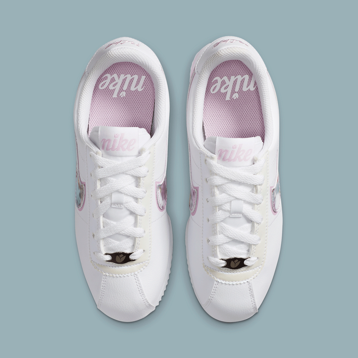 Nike cortez white outlet with pink swoosh