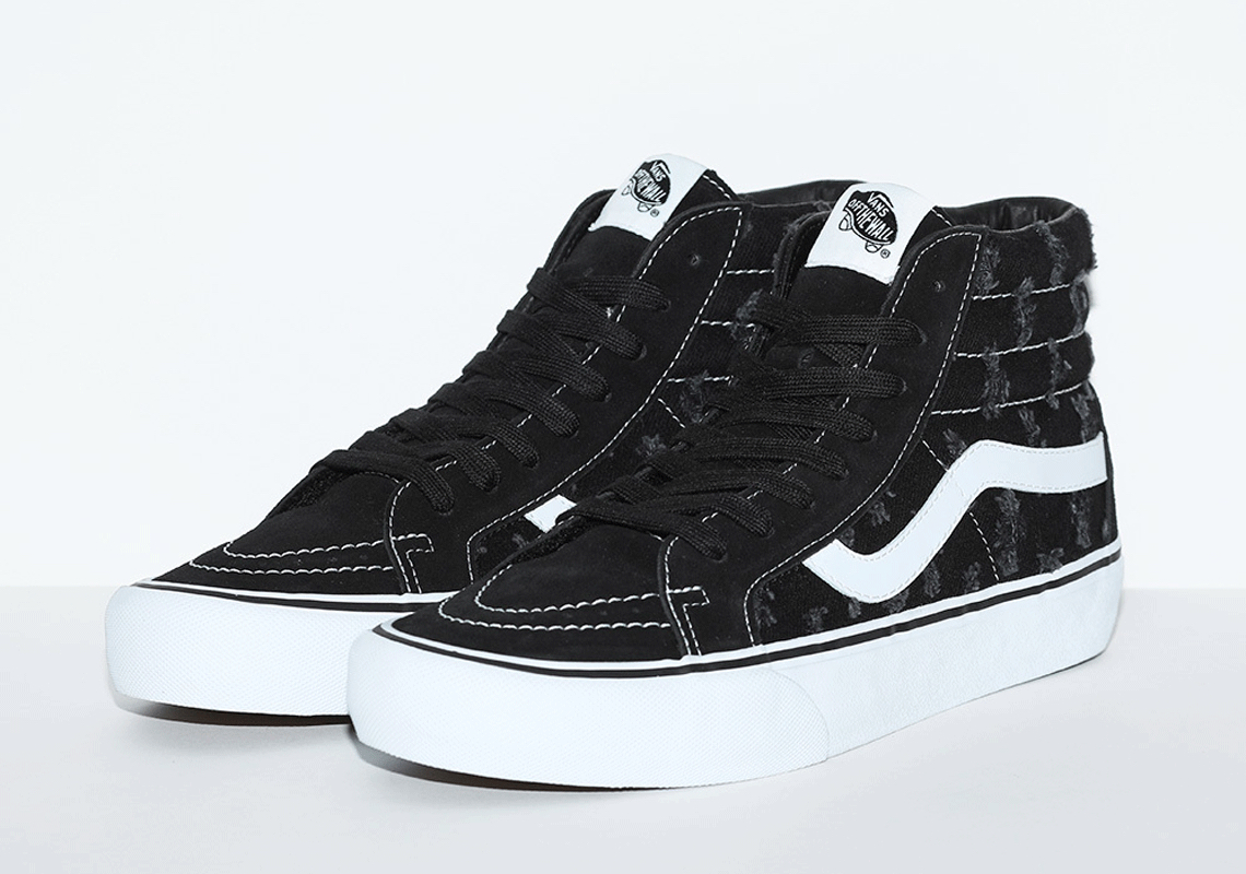 black vans with holes