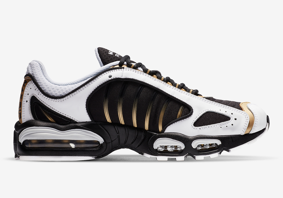 nike tailwind black and gold