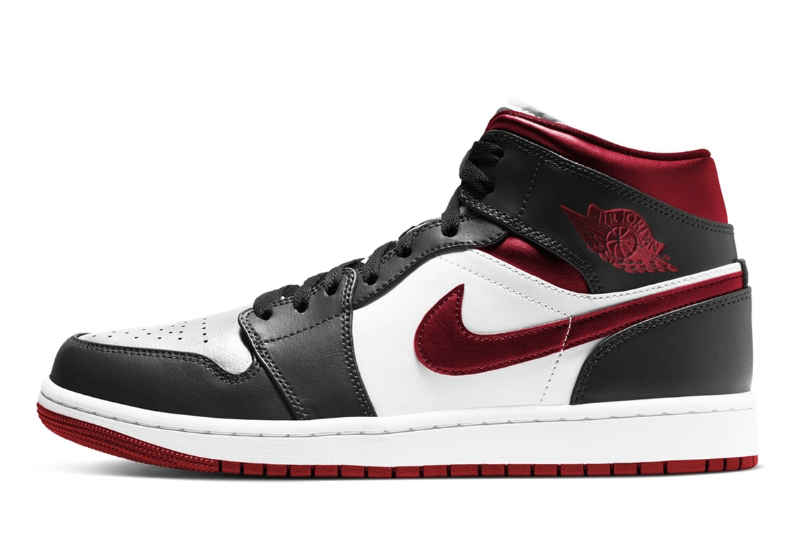 The Air Jordan 1 Mid Appears With Metallic Red And Silver Accents