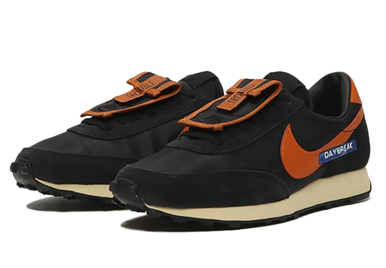 nike daybreak pocket black orange