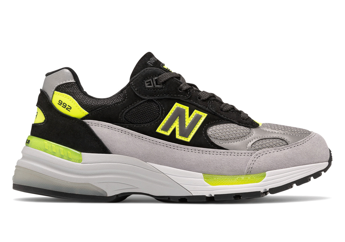The New Balance 992 Pairs Black And Gray Uppers With Bright Volt Accents