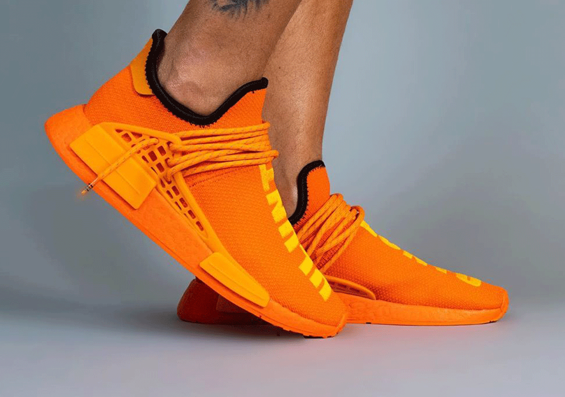 Orange human race store nmd