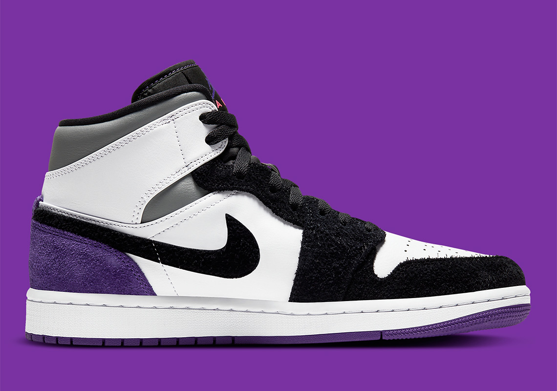 air jordan 1 mid se appears in varsity purple