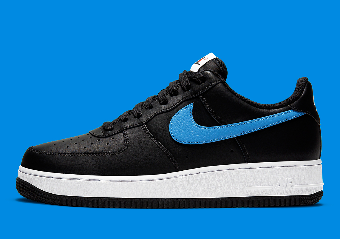 nike air force 1 black with blue swoosh